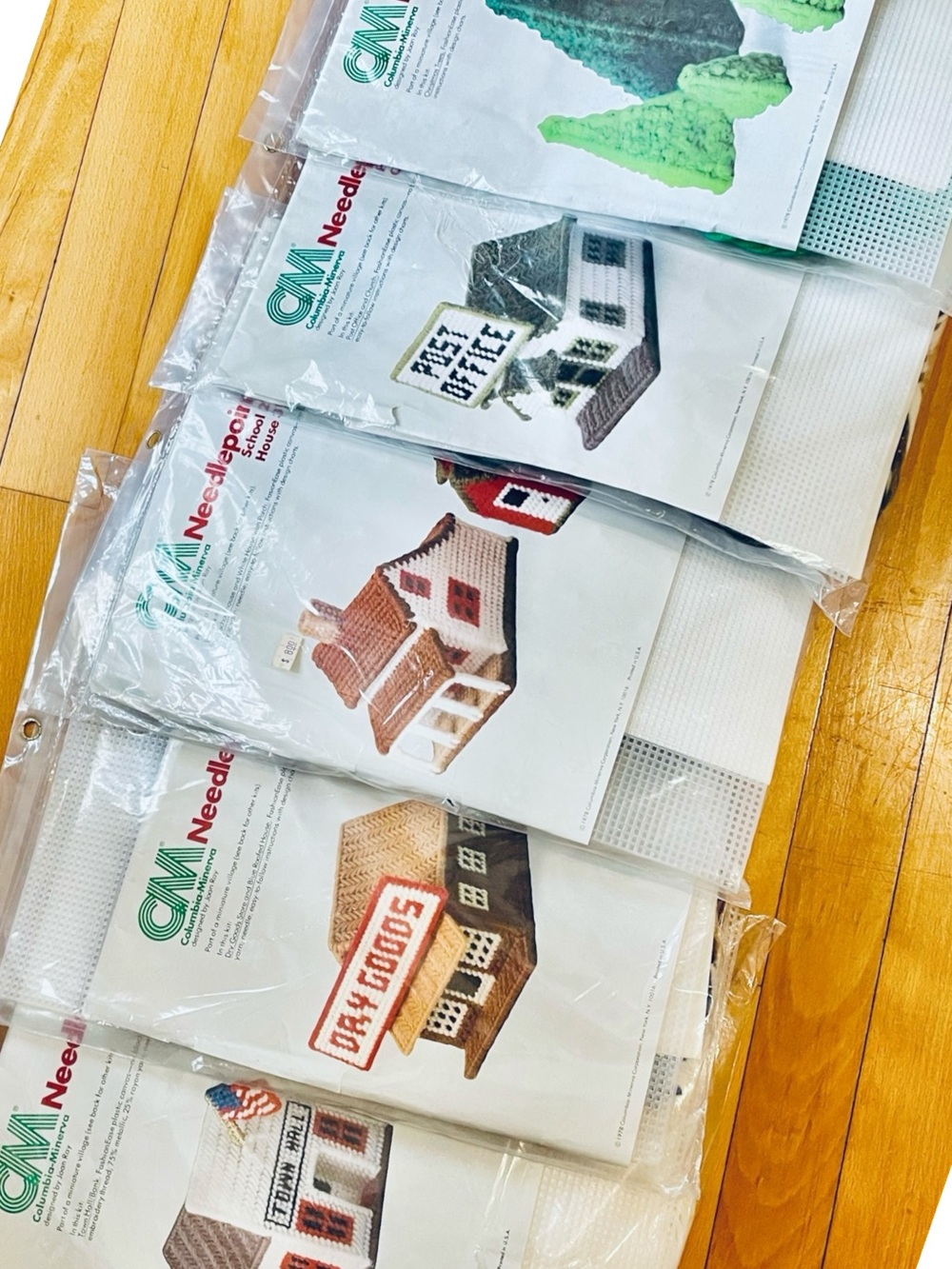 5 needlepoint kits,from 1978, miniature village, one has been opened, but unused